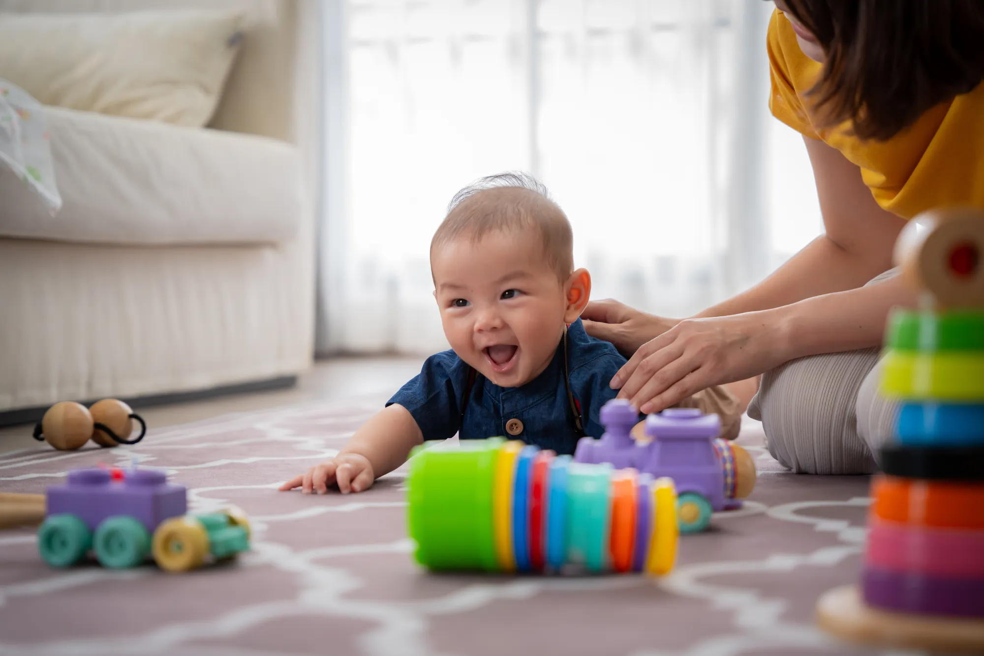 Baby doing advanced tummy time pushing up on arms