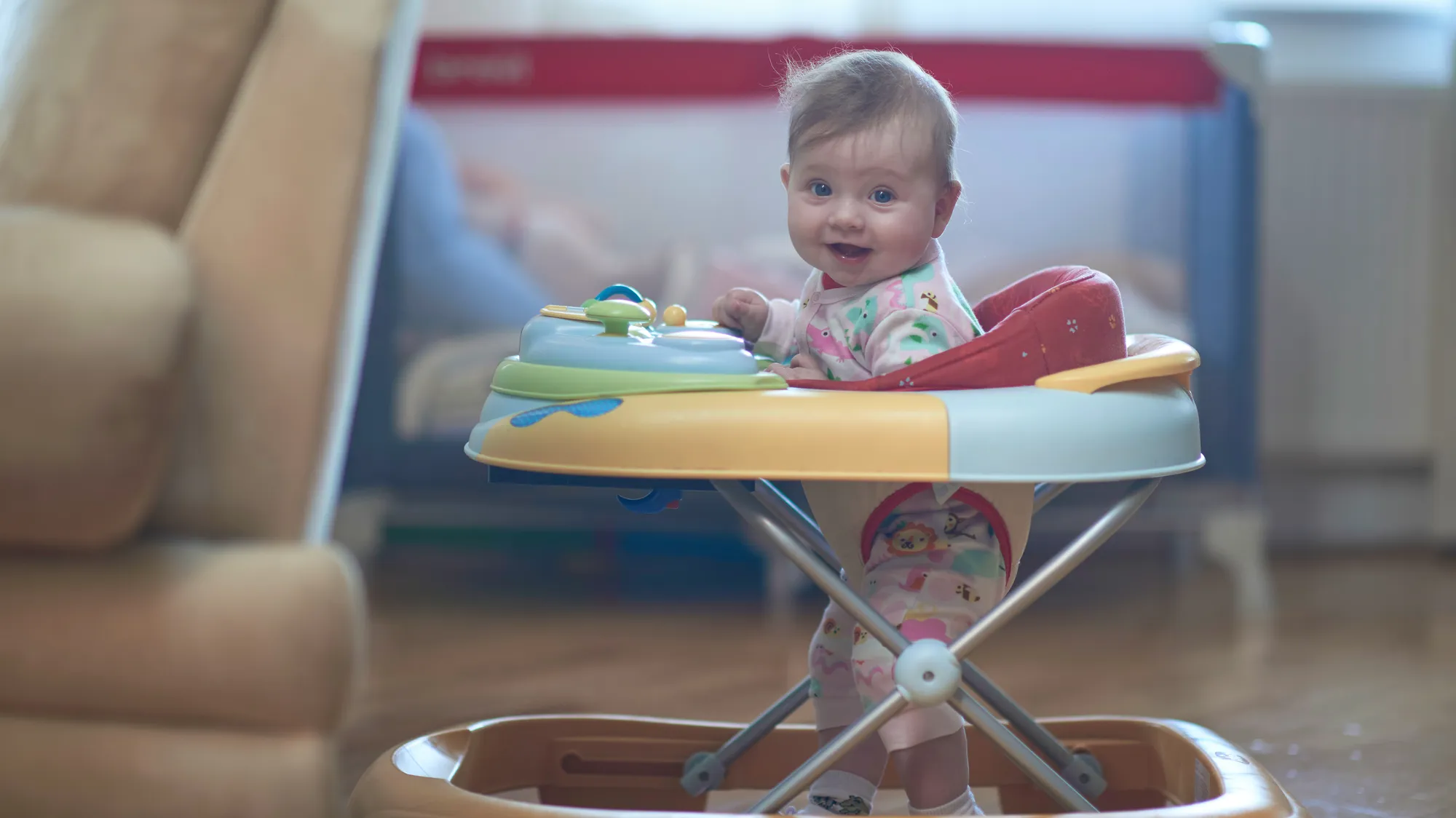 Baby learning to walk with walker